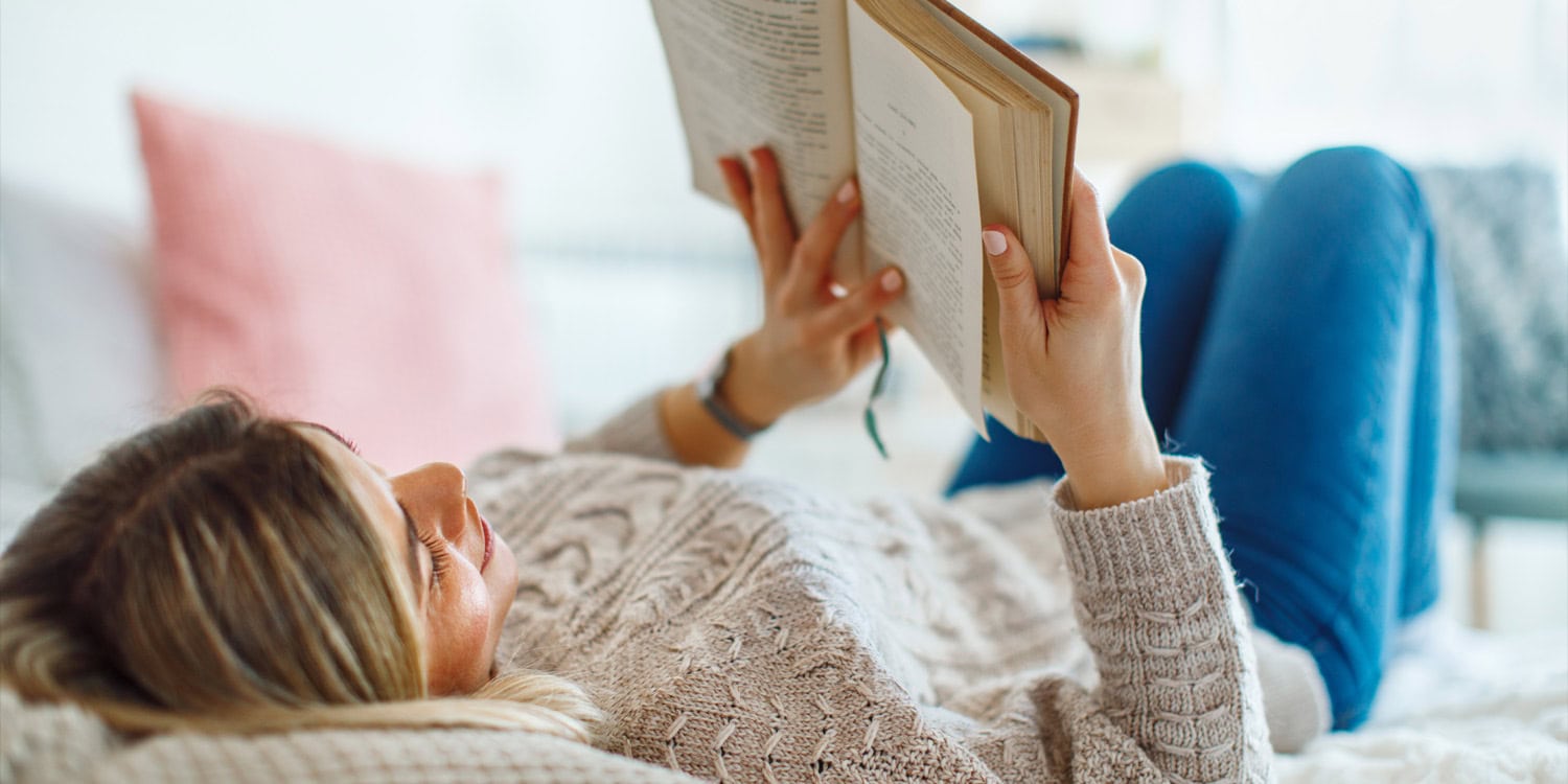 Learning to read may shape how adults reason about what others believe