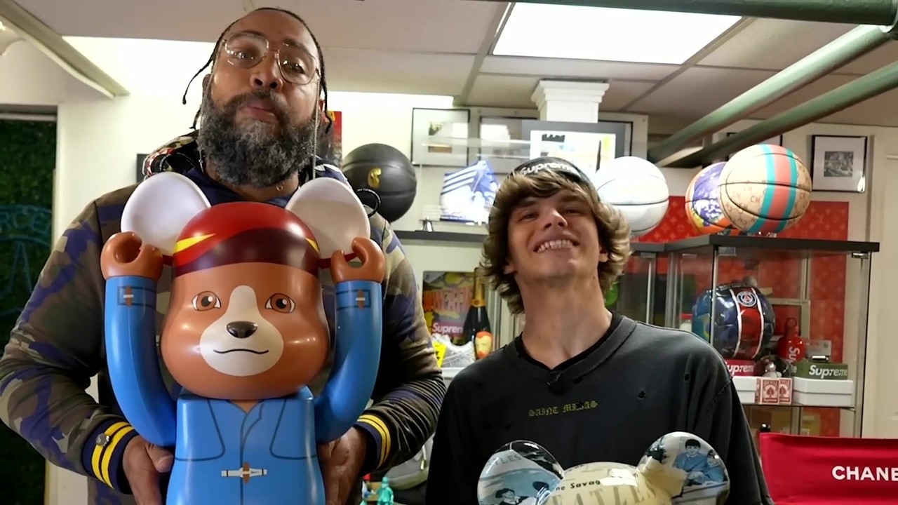 Connor unboxes a mystery box with Gucci, Louis Vuitton and KAWS