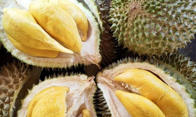 Chinese actor Wang Yibo samples durian during Malaysia food tour