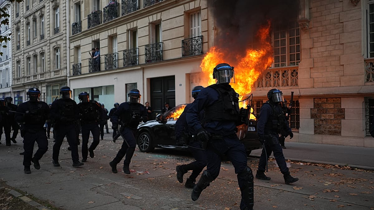 Dozens arrested as protesters clash with security forces in Paris