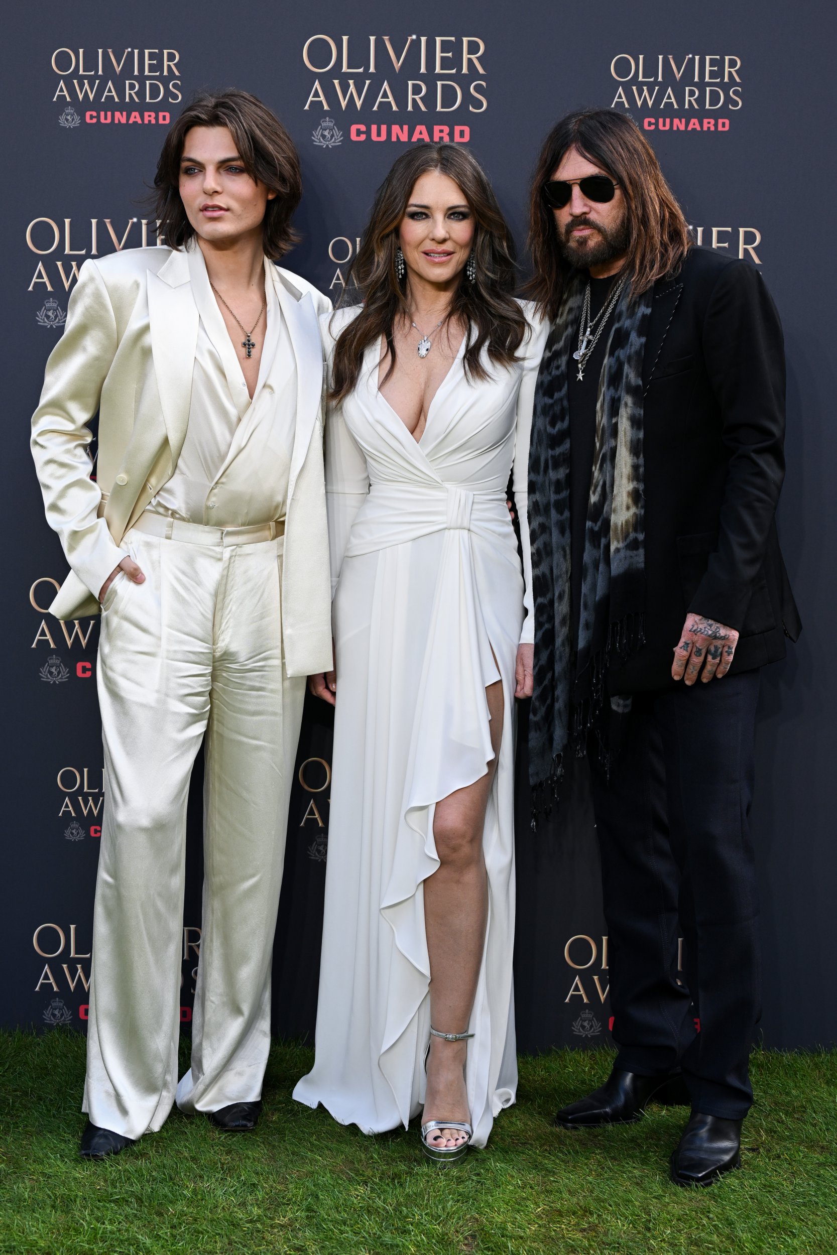 Liz Hurley flashes engagement ring as she gets engaged to Billy Ray Cyrus