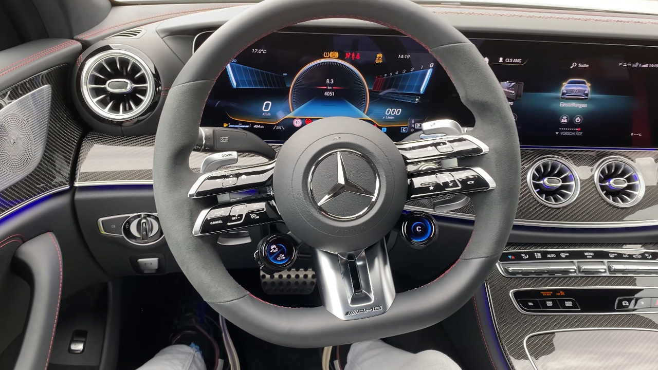 Inside the sleek upgraded AMG carbon cabin and red stitched leather