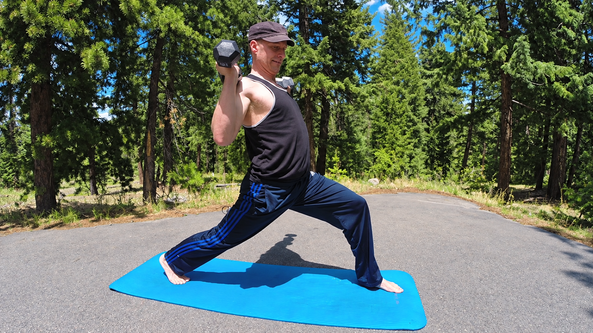 Full body strength workout combining power yoga and resistance
