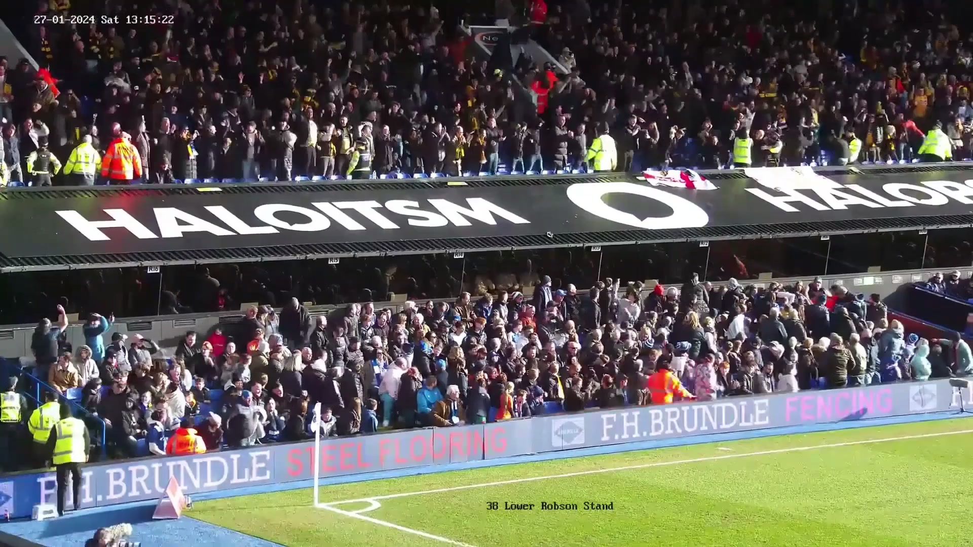 Football fan cleared of assault after falling off upper tier