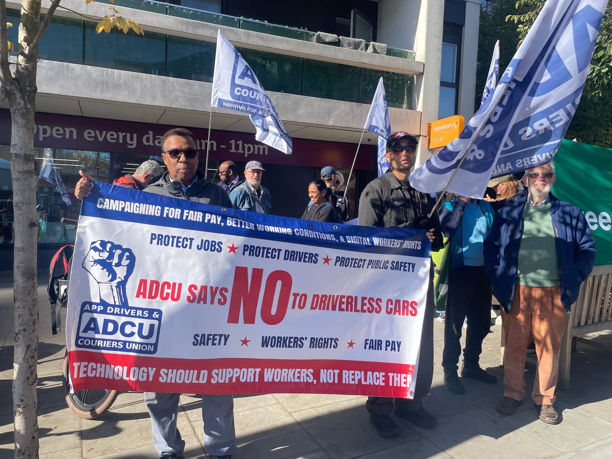 Drivers fear job losses as protesters rally against robotaxi rollout