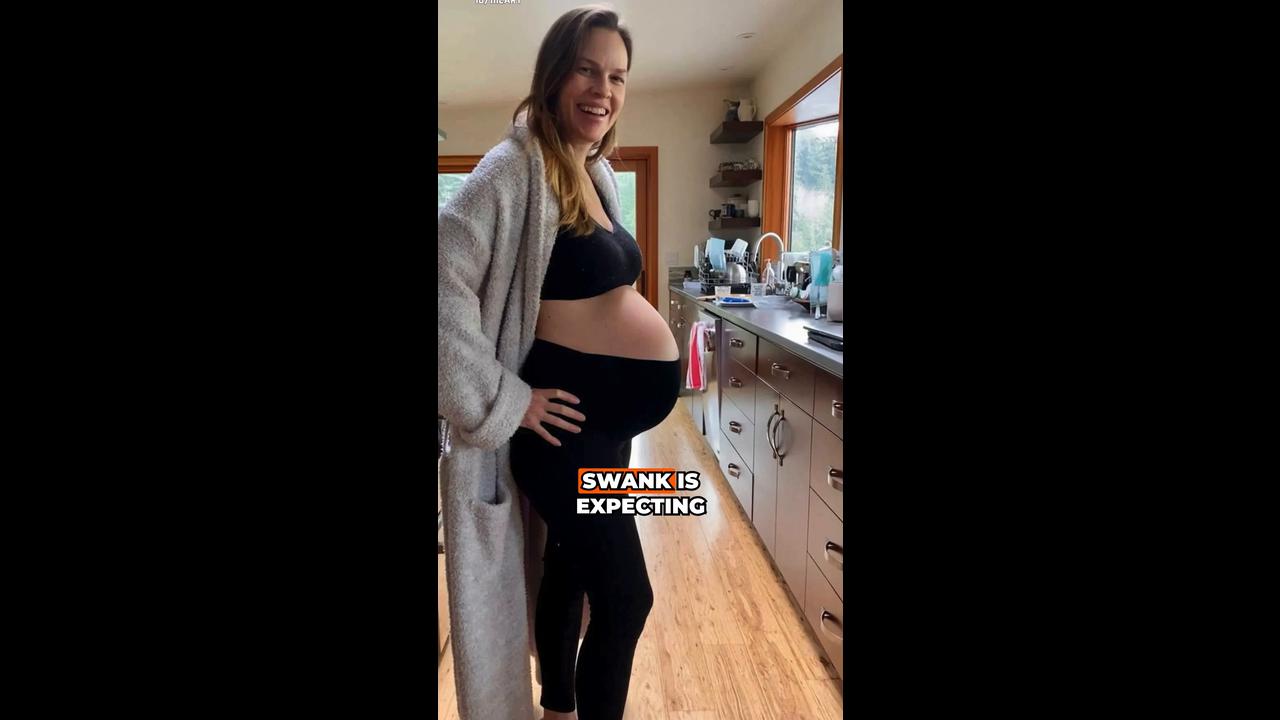 Hilary Swank shows off baby bump at 52