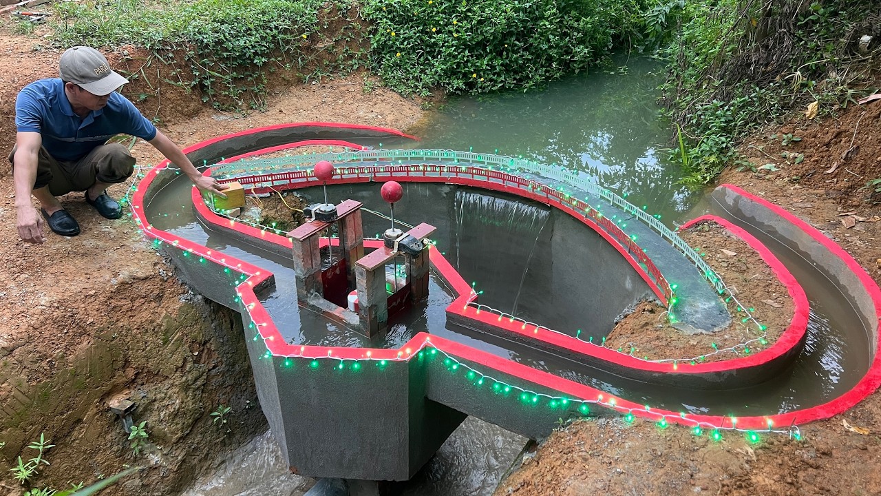 Building a mini curved hydroelectric dam with unique turbines