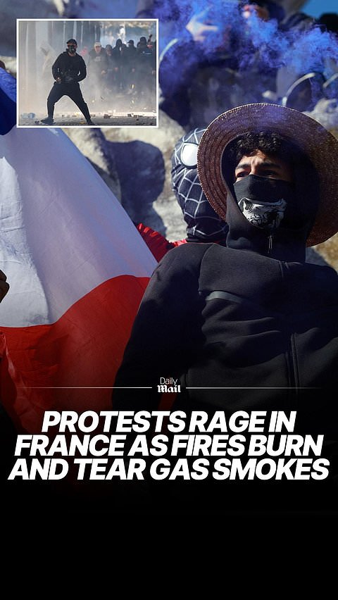 Fires rage across France as riot police fire tear gas at crowds