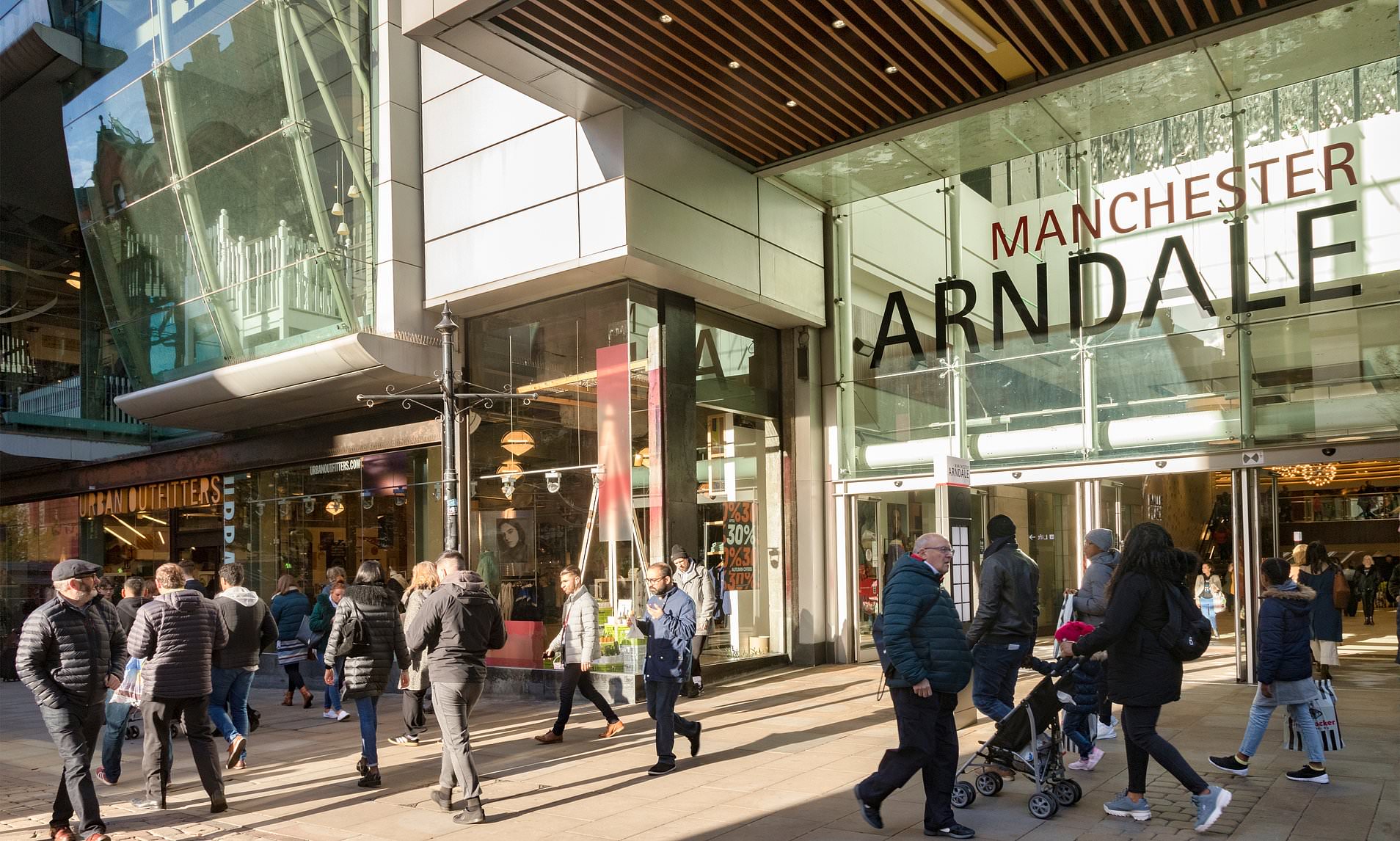 Boy, 14, is rushed to hospital after being stabbed at Manchester city ...