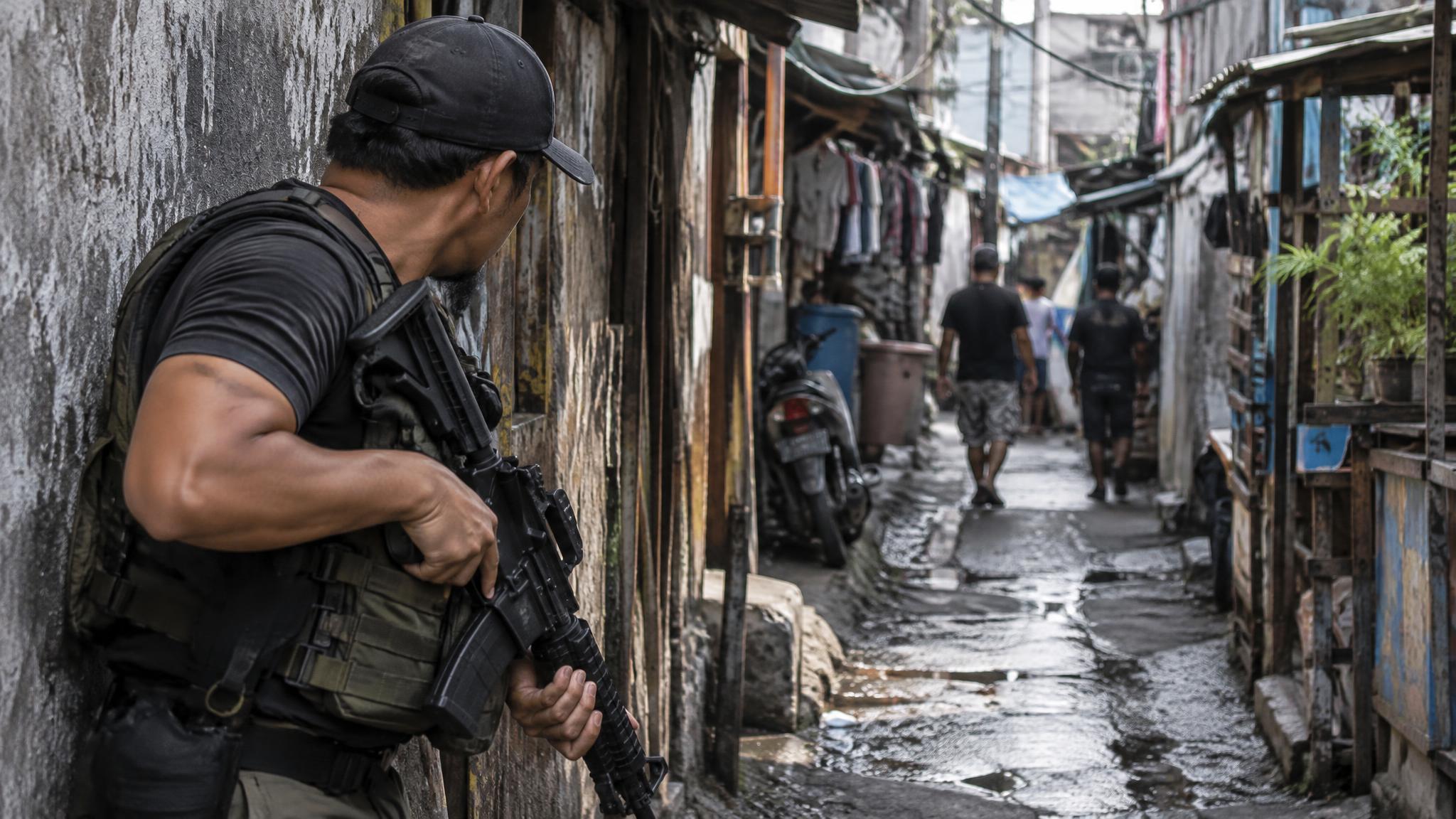 An armed Philippine bounty hunter infiltrates a heavily fortified ...
