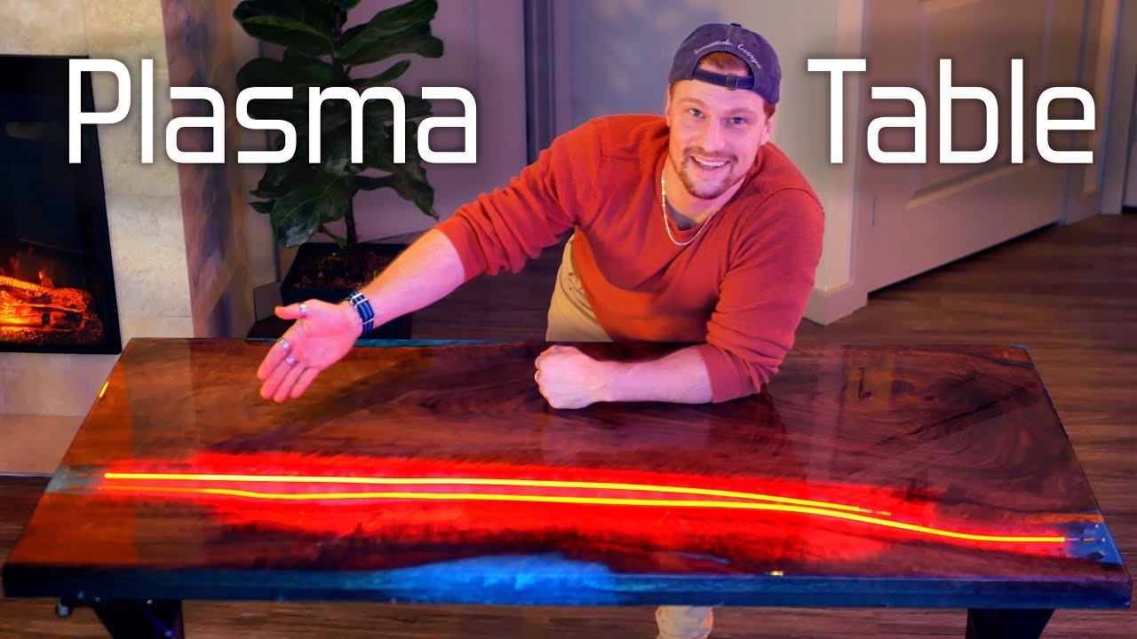 A touch responsive plasma filled river table