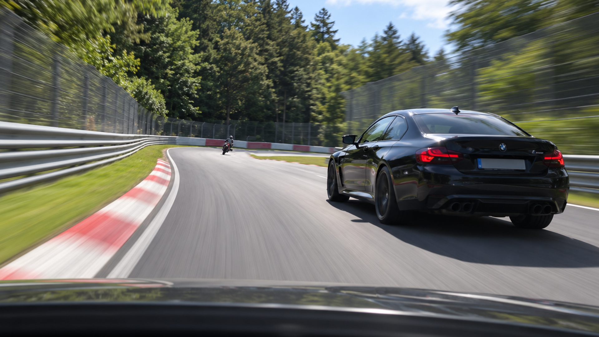BMW M4 tracks a motorcycle through a tight bend
