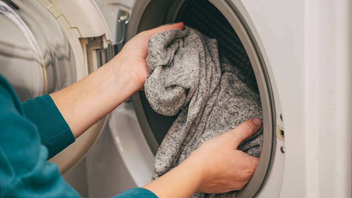 Woman's laundry room makeover turns an ordinary space into an English ...