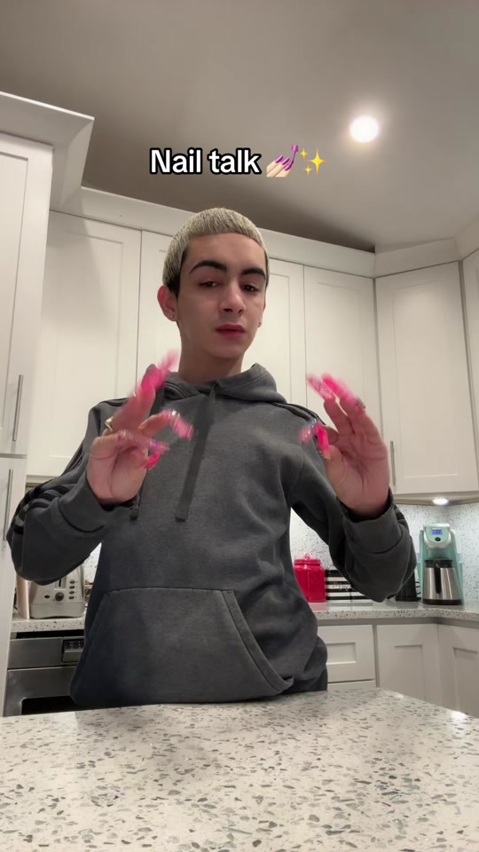 Trying everyday tasks with extra long pink nails