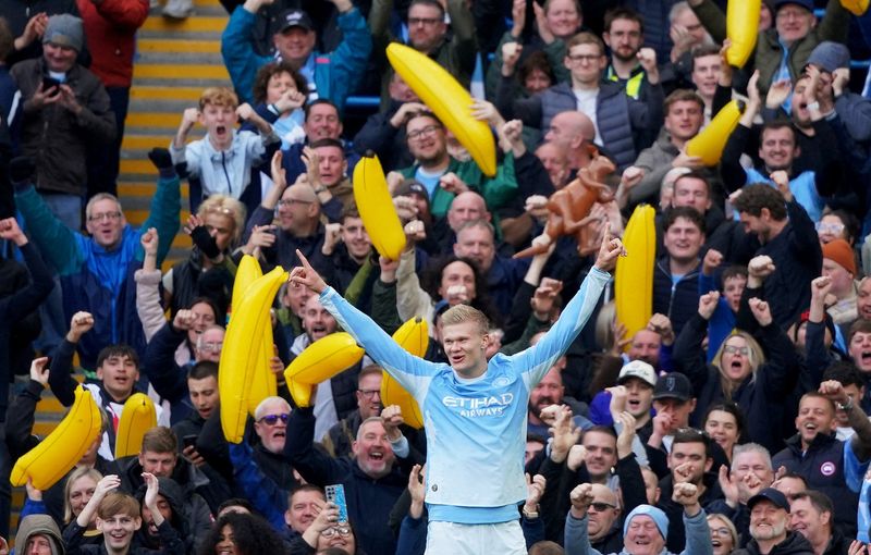 Soccer-Haaland double helps Man City win, Neto brace cheers Chelsea