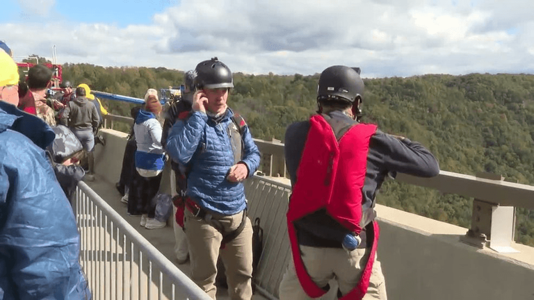 Base jumpers brave 876-foot drop at New River Gorge Bridge Day