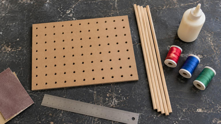 Make a pegboard thread rack that fits your spool collection