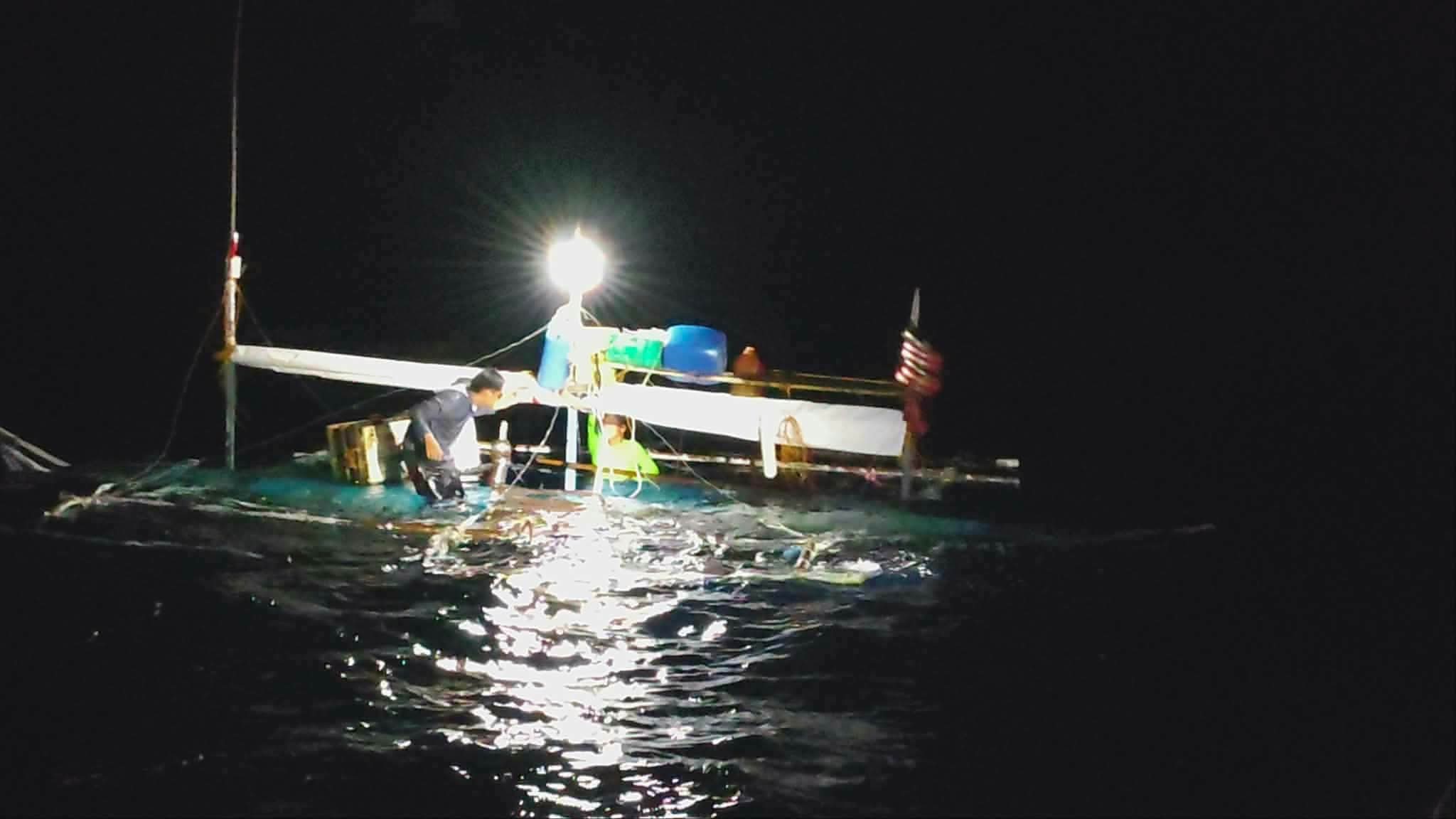 2 rescued from partially submerged fishing boat off Palawan