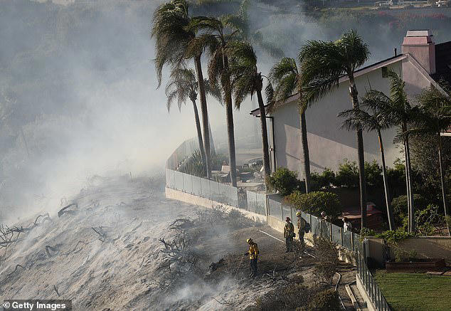 Brush fire threatens million dollar homes in southern California as ...