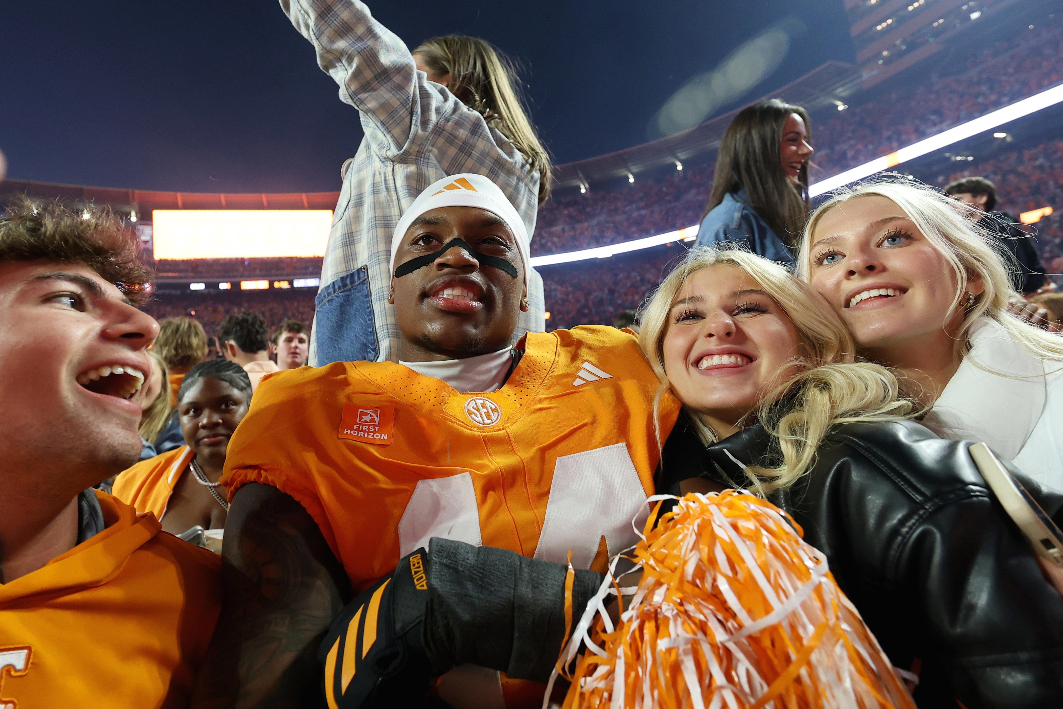 Tennessee fans storm field as Vols beat Alabama. Will program be fined?