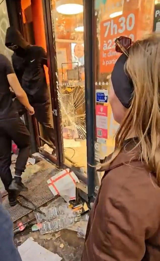 Moment woman begs French rioters not to loot shop as violent protests ...