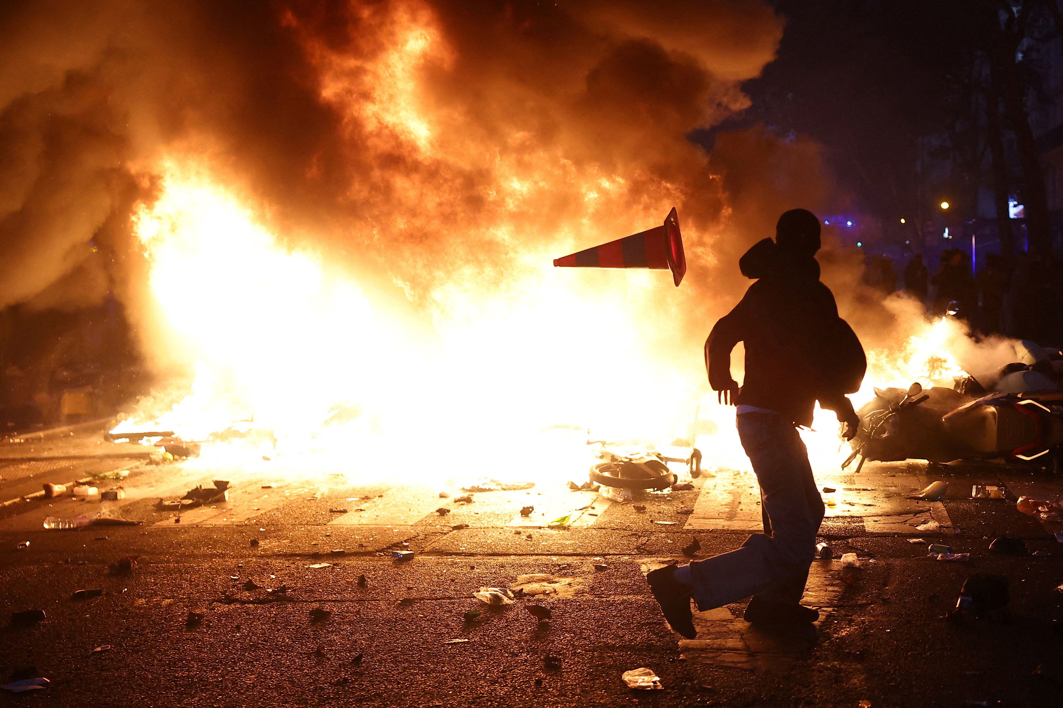 France reels from unrest, with public buildings burned and hundreds ...