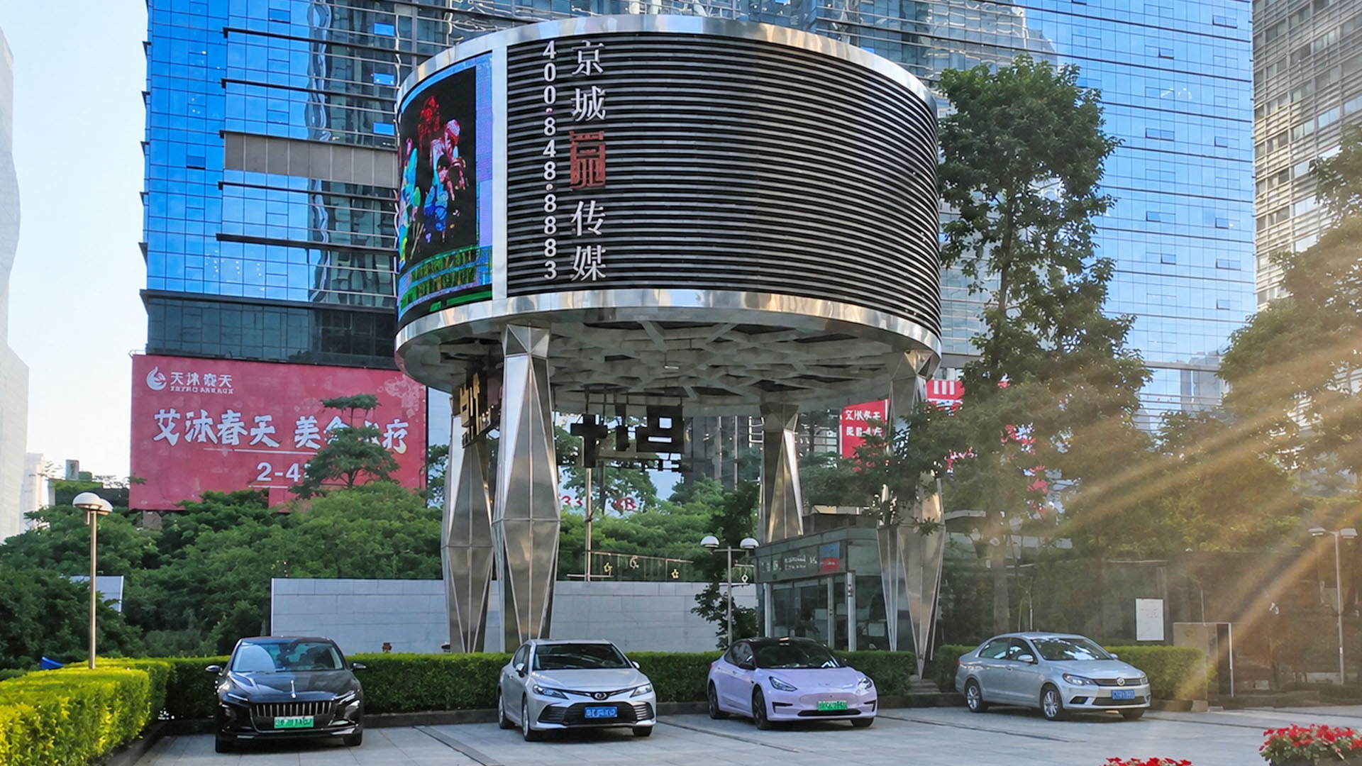 Shenzhen glass towers surround this unusual circular media display
