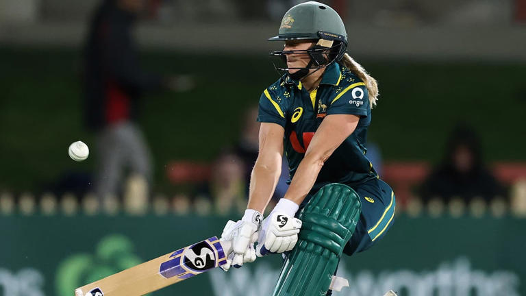 Perry half-century lifts Australia to victory