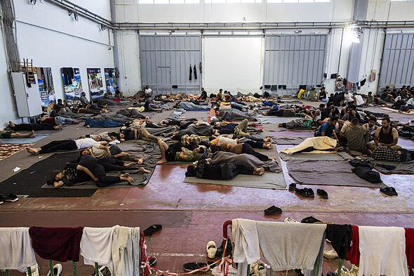 Migration crisis erupts as 19,000 flood Greek island loved by Brits ...