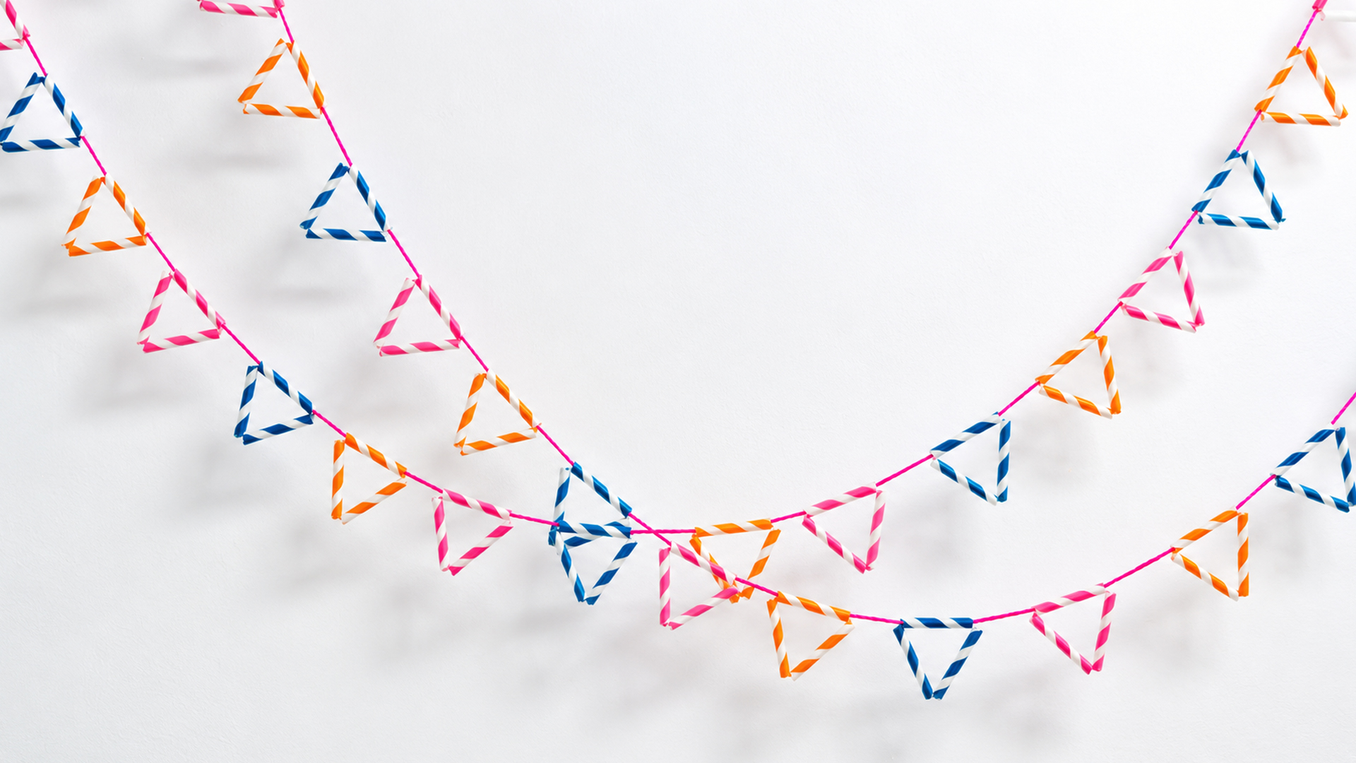 The brilliant geometric party banner you can make with paper straws