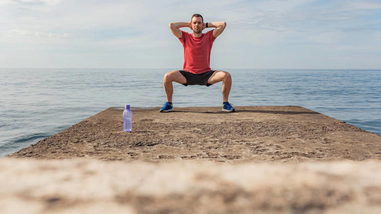 The 6-week bodyweight program built to get you to 100 squats without ...