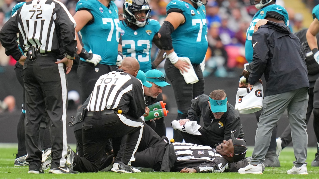 NFL ref injured slipping on field, latest on Larry Smith after being ...