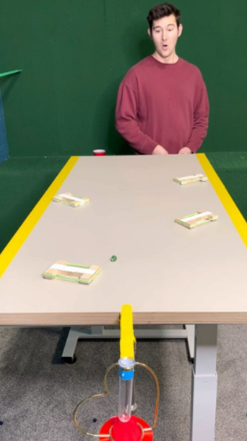 Four bounces make this marble trick shot amazing