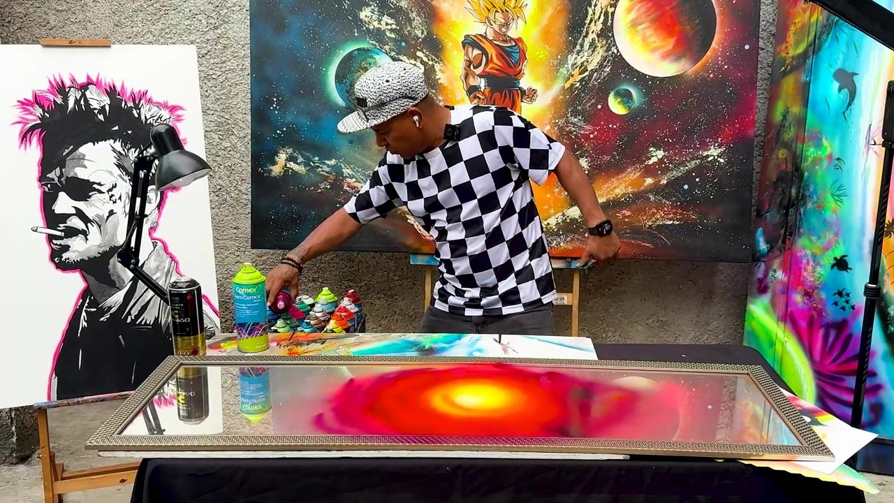 Street artist spray paints a tree of life on a mirror