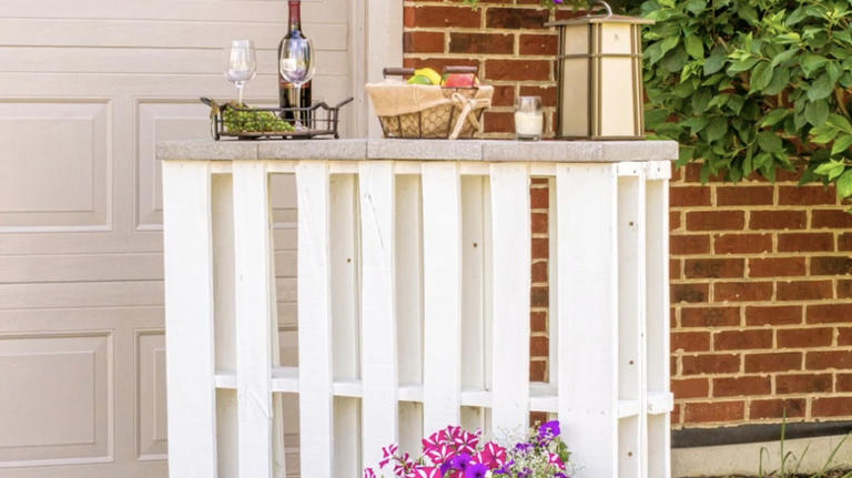 Woman Upcycles Old Wood Pallets Into A Backyard Showpiece With An ...