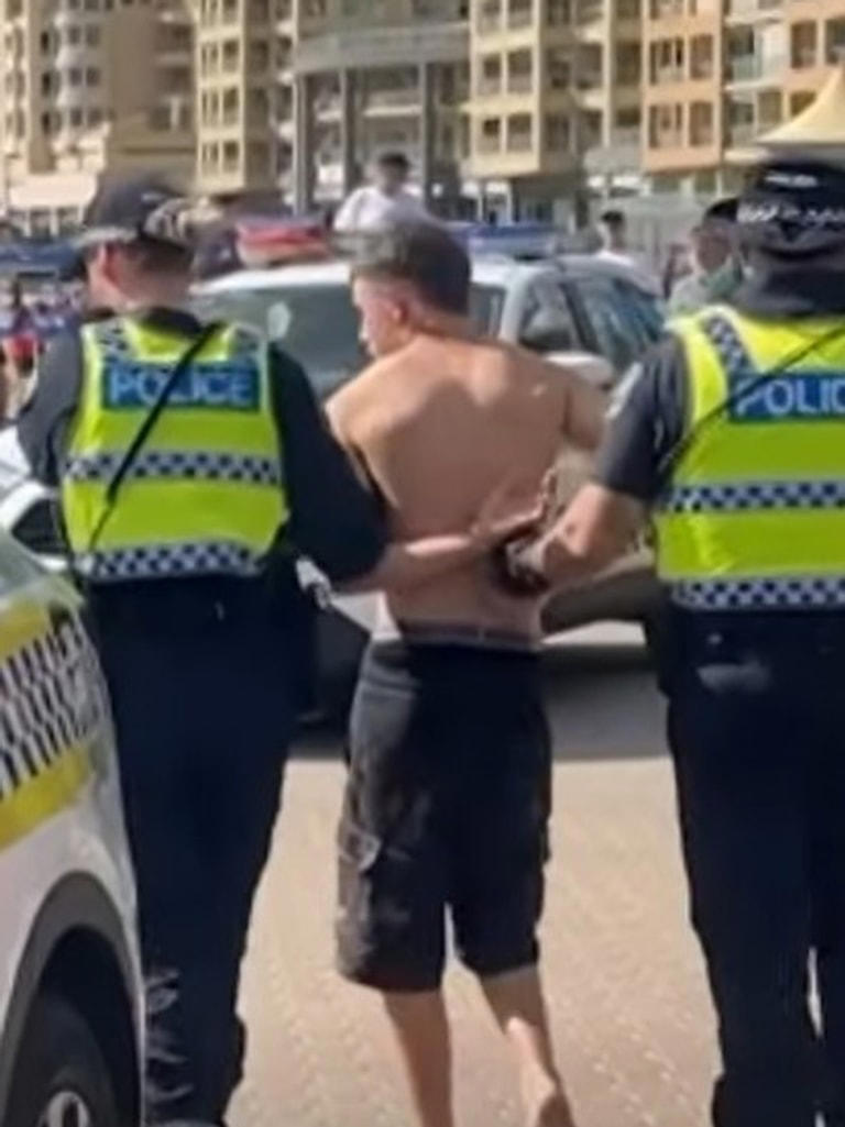 Teen charged after 'disgusting' beach act