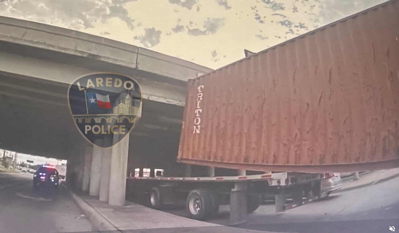 Shipping container truck hits top of Del Mar bridge