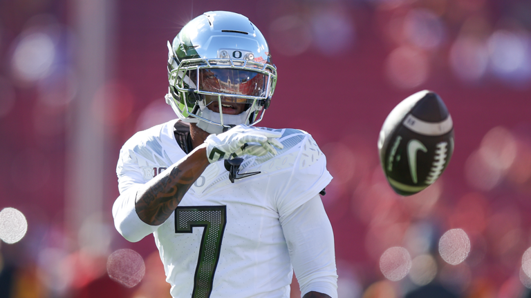 Oregon WR Evan Stewart arrested after win over Nebraska, charged with ...