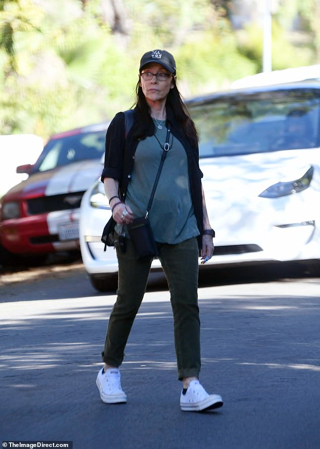 Iconic 80s nepo baby twin who has celebrity twin seen on rare outing ...