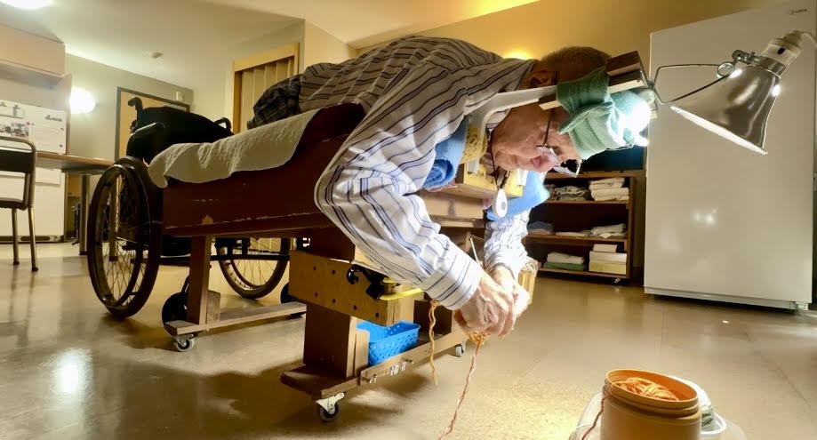 Manitoba senior with knack for knitting uses custom-made cot