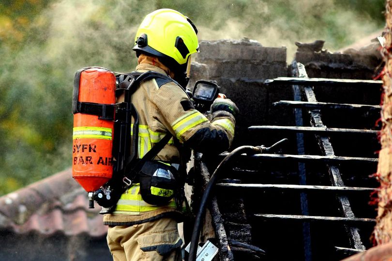 Seven pictures show scene as fire crews tackle Sheffield garage blaze