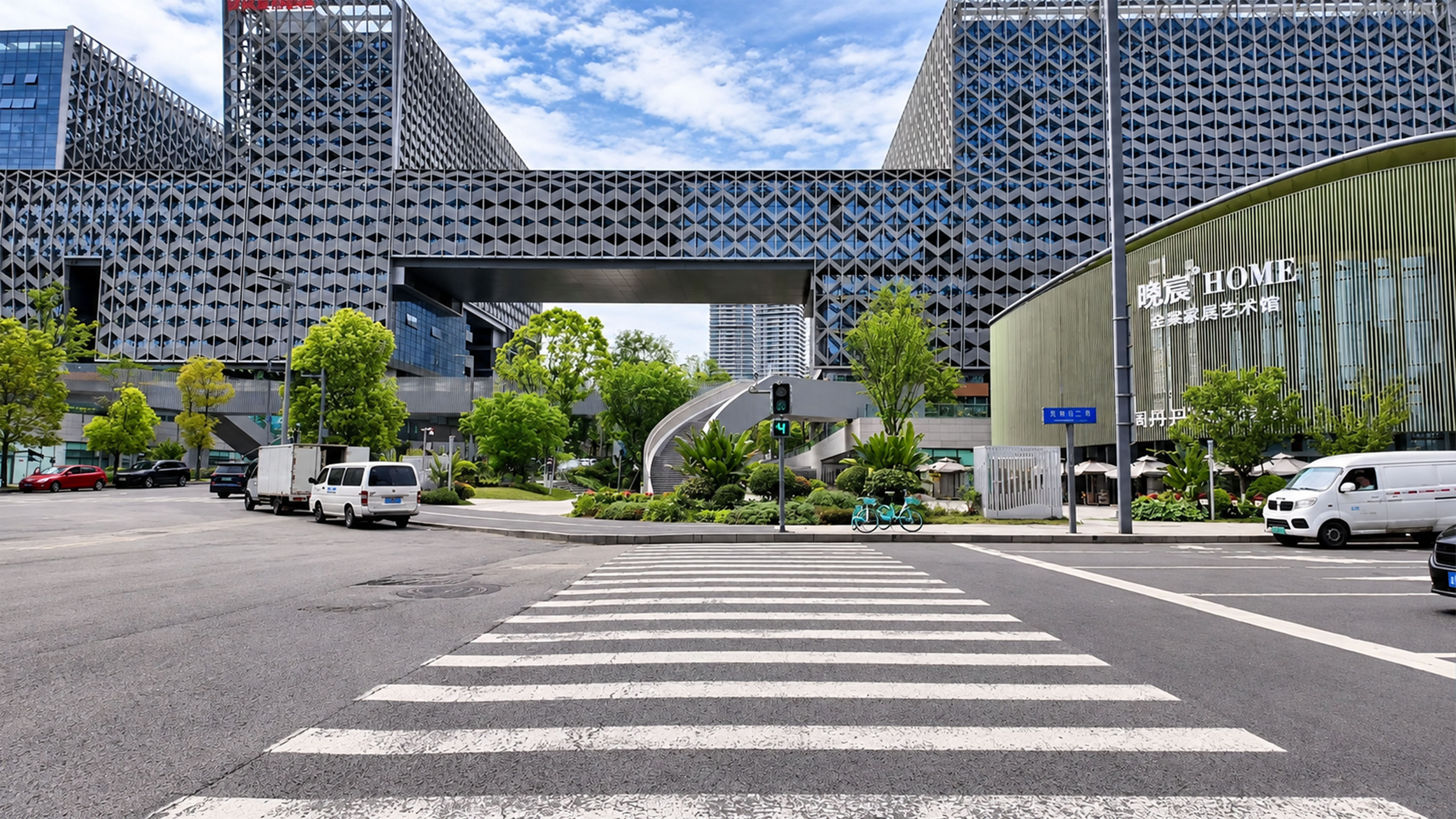 Modern architecture frames this wide urban crossing in China