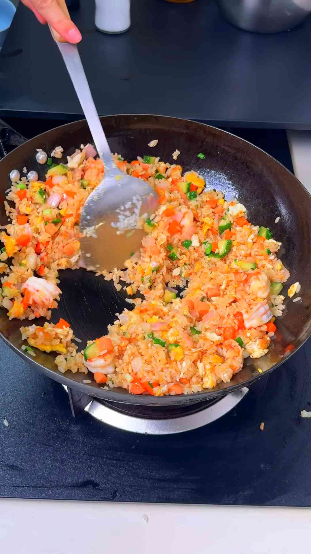 Golden shrimp egg fried rice with tender seafood