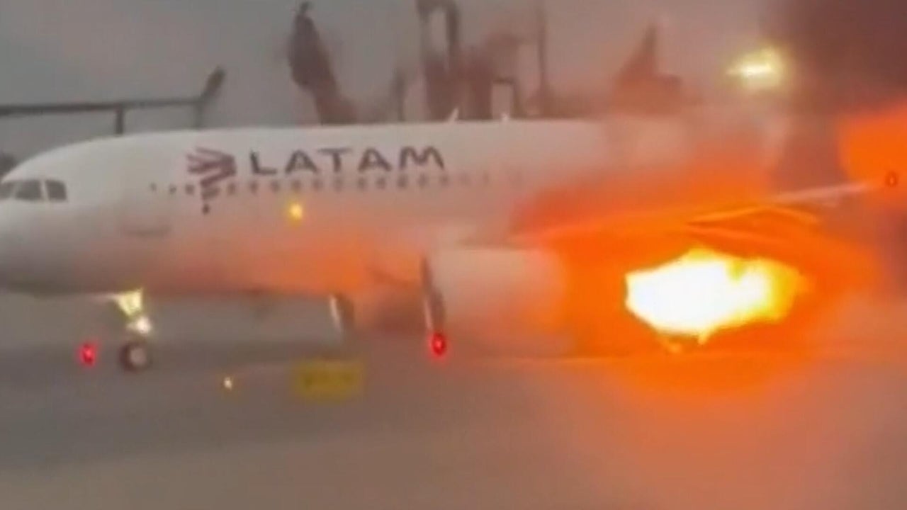Plane engine shoots flames before takeoff from Lima, Peru