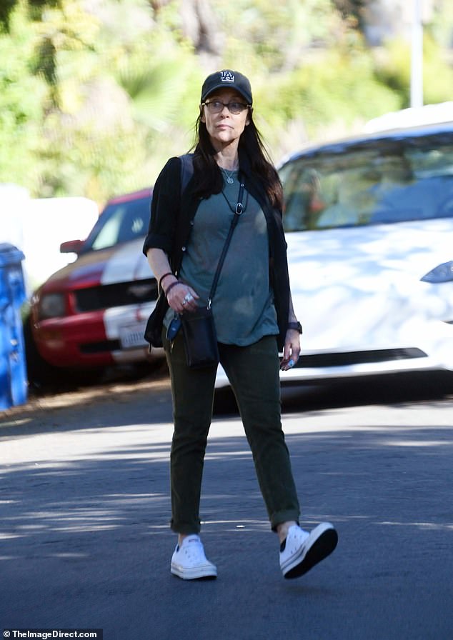 Iconic 80s nepo baby twin who has celebrity twin seen on rare outing ...