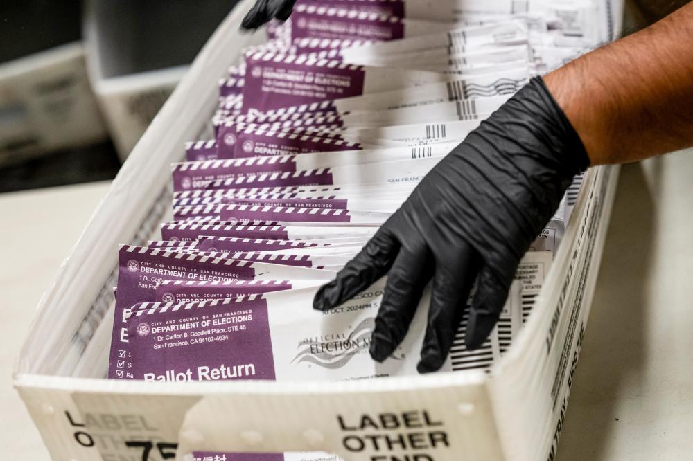 DOJ charges 28 green card holders in California over alleged voter fraud
