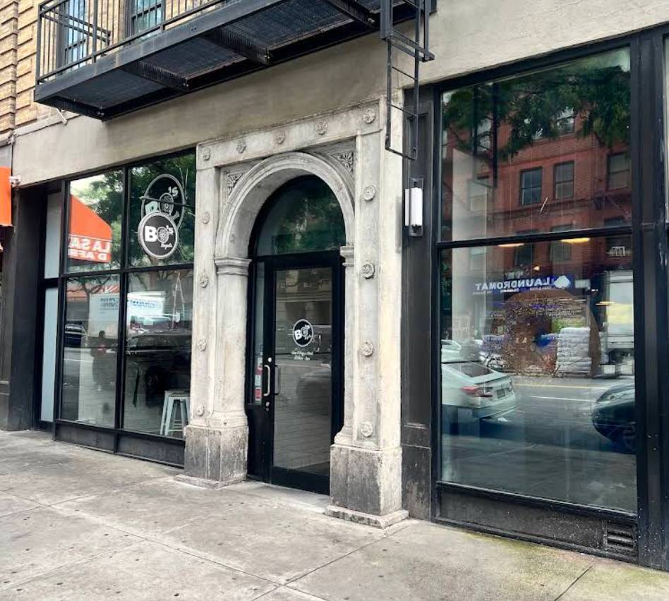 Bagel shop removes cartoon sign after being accused of blackface