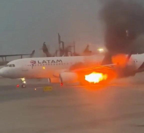 Passenger jet engine shoots out flames before takeoff