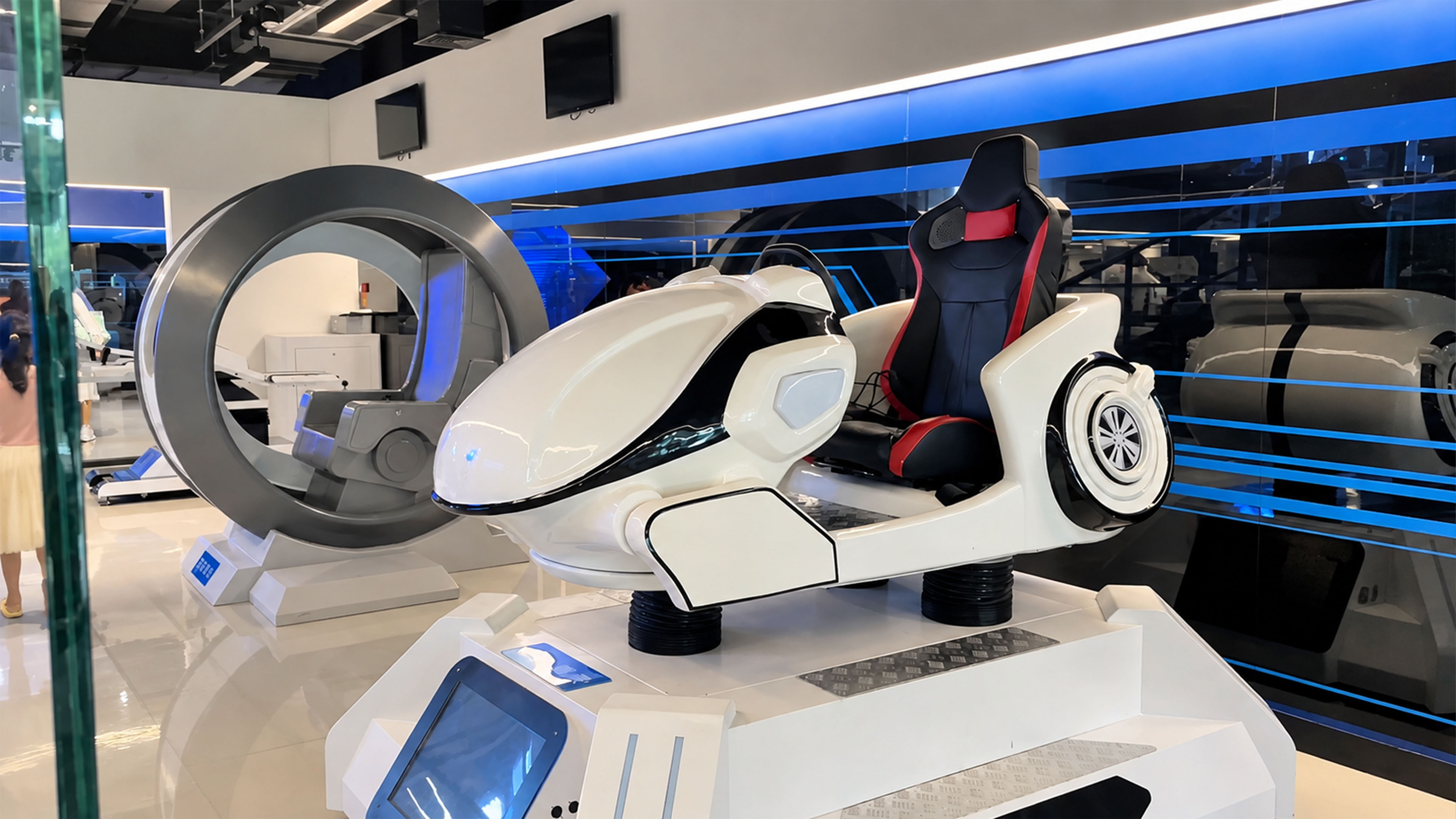 China’s tech exhibit displays this unusual pod like simulator