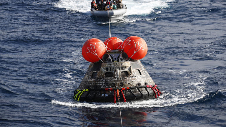 Why do returning spacecraft usually land in water?